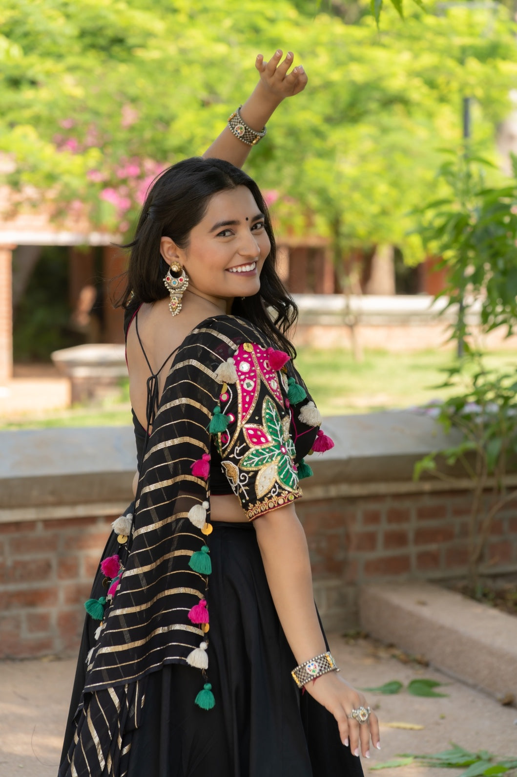 Black designer Navratri cotton satin lehenga set with multicolour detailing and mirror work blouse and georgette dupatta garba outfit 