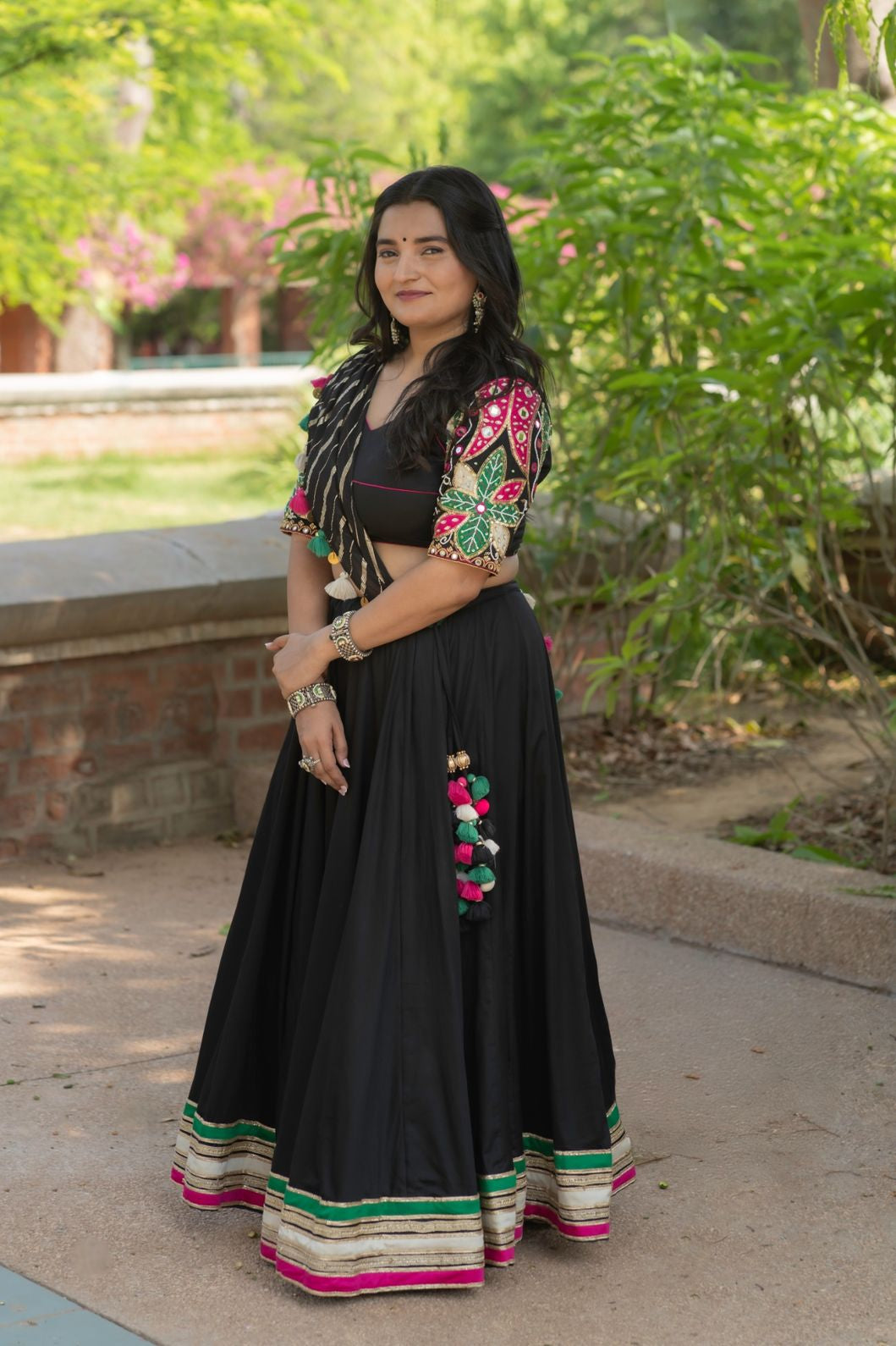 Black designer Navratri cotton satin lehenga set with multicolour detailing and mirror work blouse and georgette dupatta garba outfit 