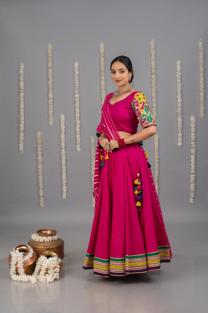 Pink garba outfit with mirror work and multicolour border detailing and georgette dupatta 