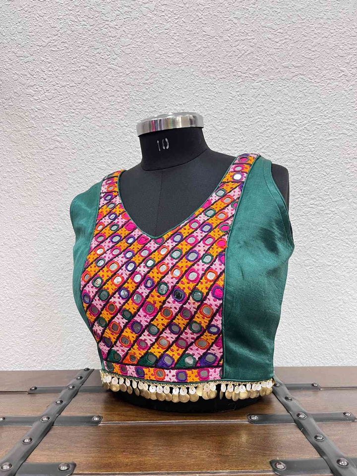 Rama Green gajji silk blouse with mirror work embroidery and tikki lace waist detailing