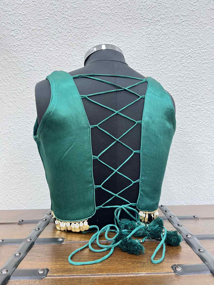 Designer rama green Navratri blouse with criss cross dori back and mirror embroidery