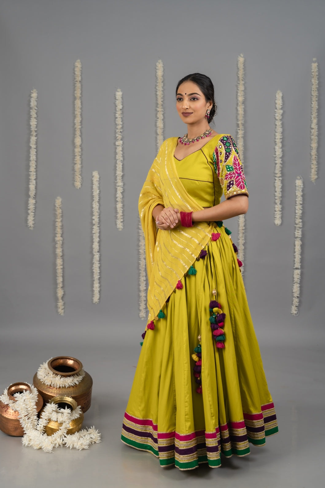 Yellow cotton satin Navratri garba lehenga set for women with mirror work blouse and dupatta 