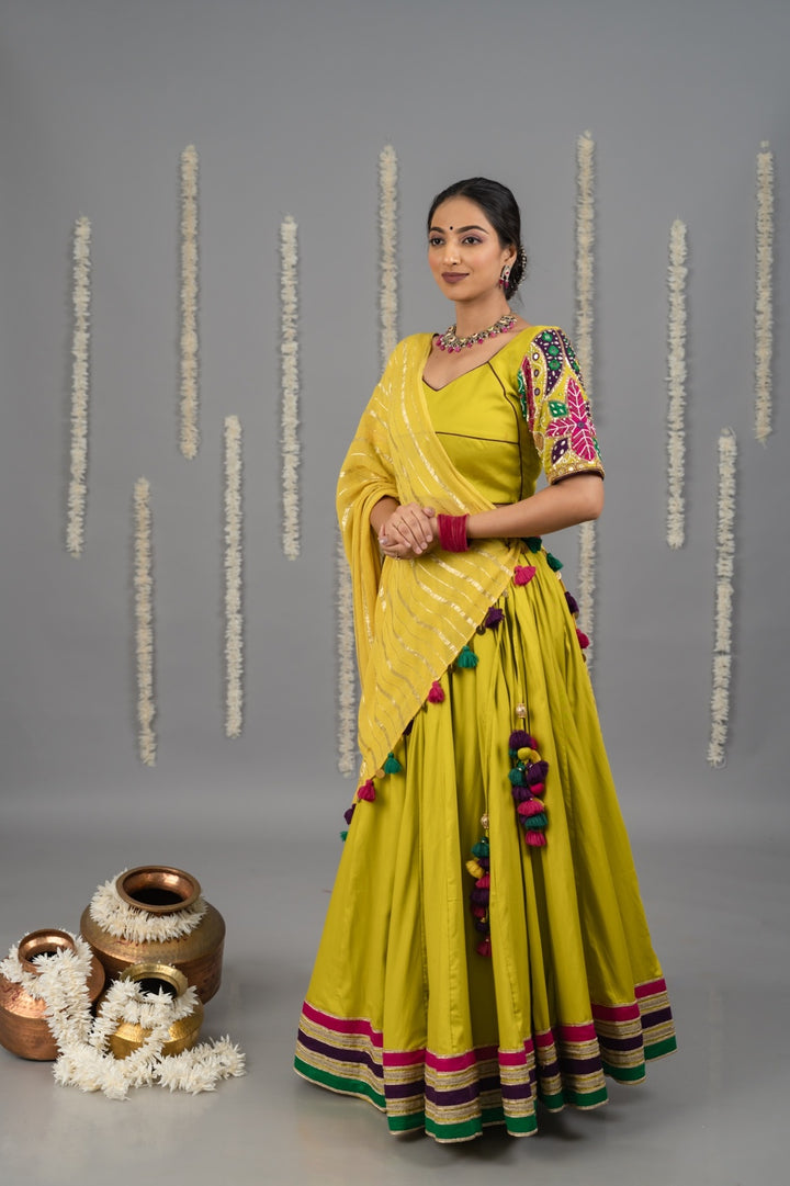 Yellow cotton satin Navratri garba lehenga set for women with mirror work blouse and dupatta 