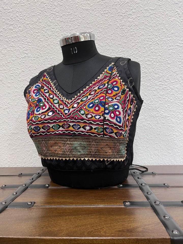 Black Gajji silk blouse with Kutchi work and golden triangle lace detailing