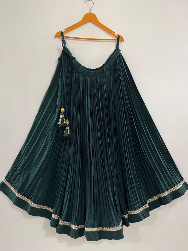 Green pleated chaniya with golden border perfect for navratri wedding garba night and puja function 