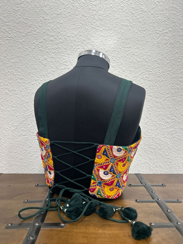 Festive designer blouse featuring handcrafted Kutchi ethnic work