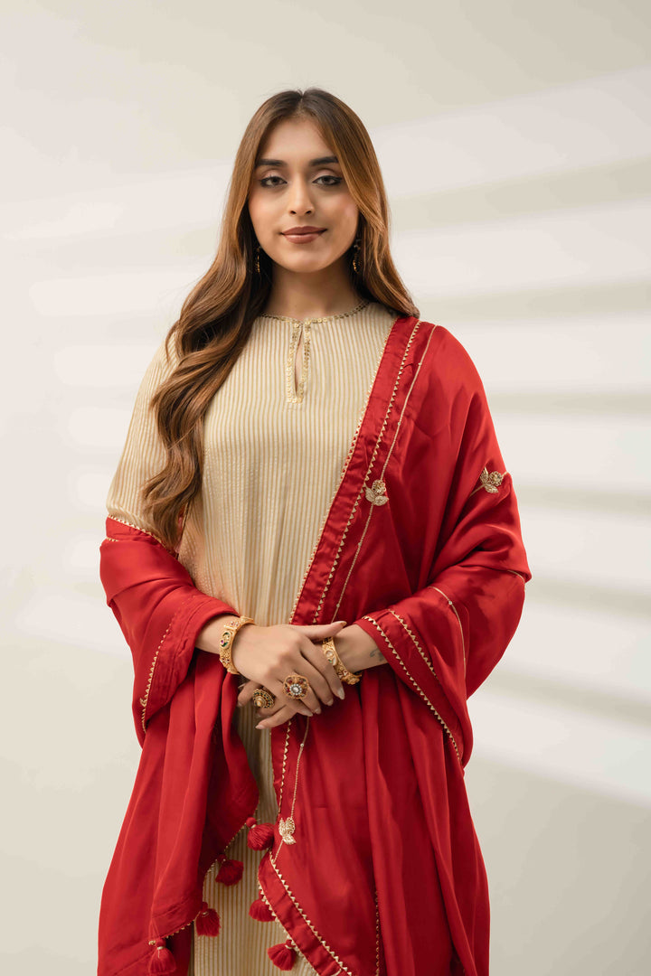 Designer golden outfit with tikki work and tassels