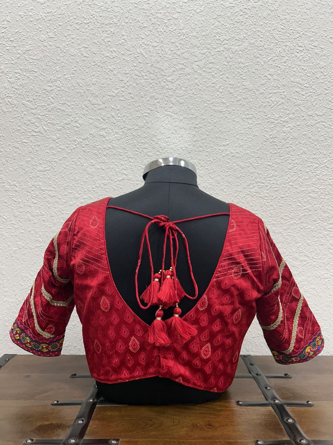 Traditional designer blouse featuring kasab detailing and ethnic festive craftsmanship