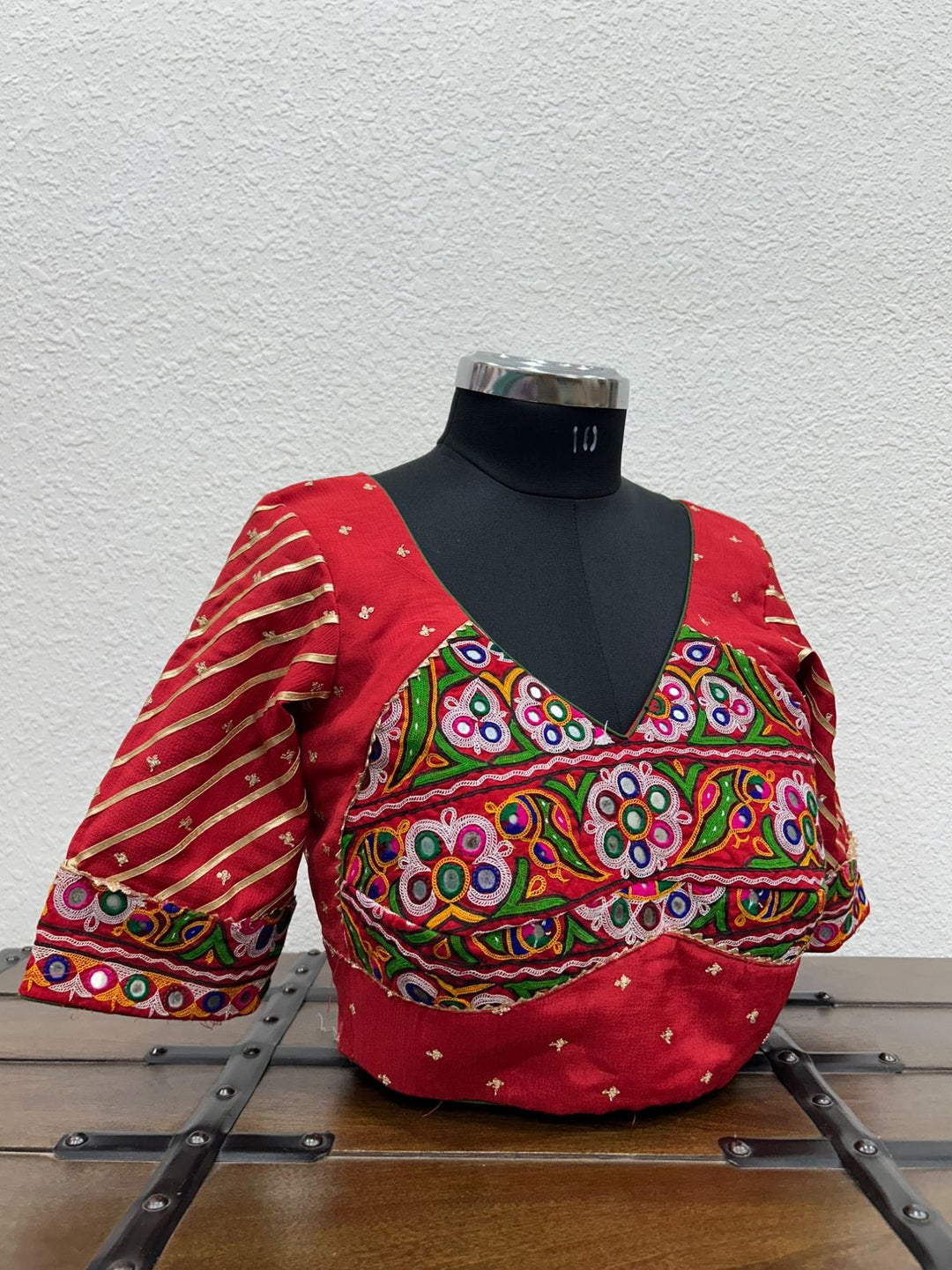 Designer festive blouse with traditional Kutchi embroidery and elegant lace sleeve detailing