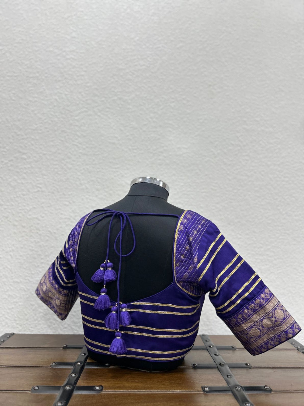 Festive designer blouse with elegant lace accents and Banarasi sleeve detailing
