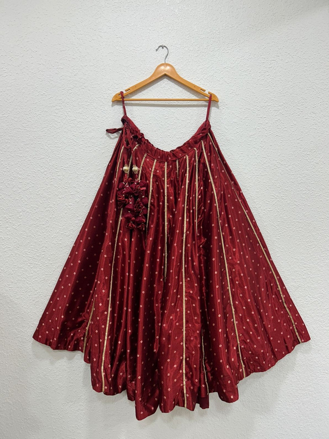 Maroon festive Bandhej chaniya crafted in luxurious Gajji silk