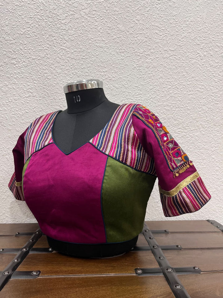 Mehendi green pink mashru silk blouse with Kutchi abhla work sleeves and striped detailing