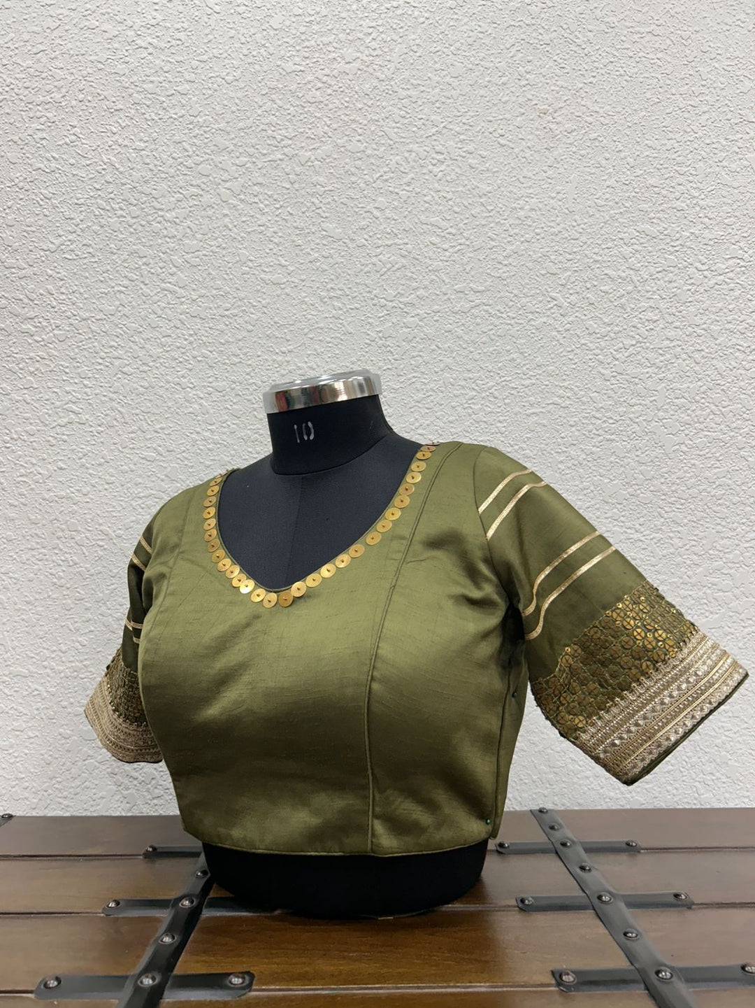 Mehendi green raw silk blouse with hand tikki embroidery and lace sleeve detailing front view