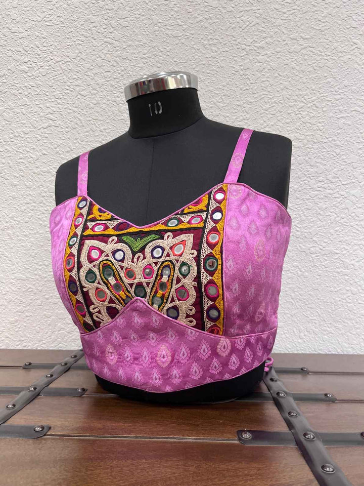 Designer festive blouse with Kutchi embroidery and criss cross dori back