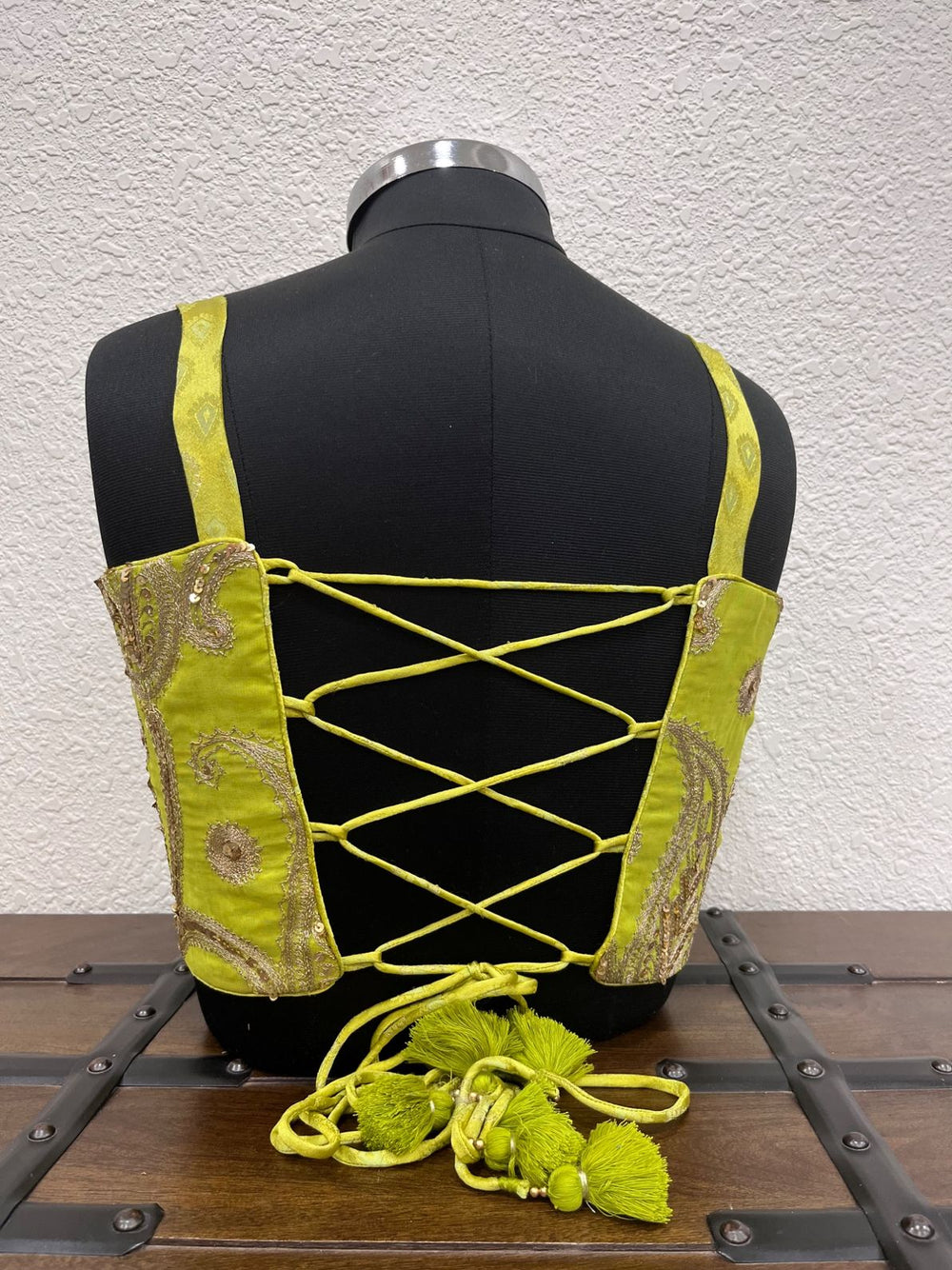 Designer neon Navratri blouse with criss cross dori back and festive detailing
