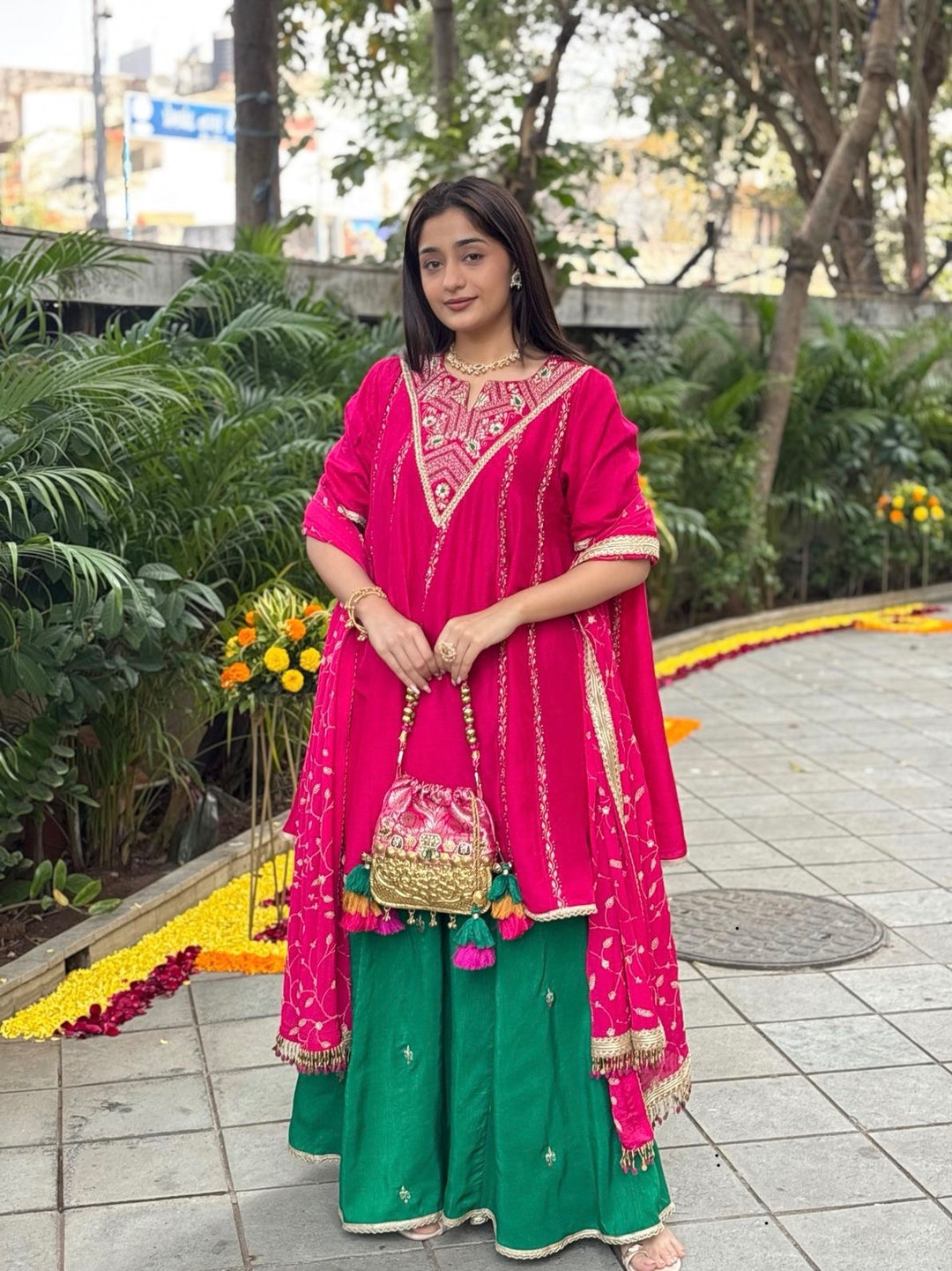 Elegant pink Anarkali ethnic outfit for festive occasions in India with detailed embroidery.