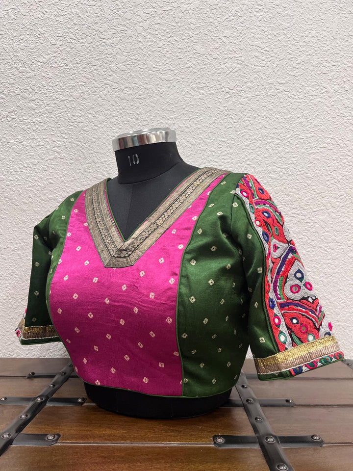 Pink green bandhej blouse with gamthi patch sleeves and Banarasi neckline.
