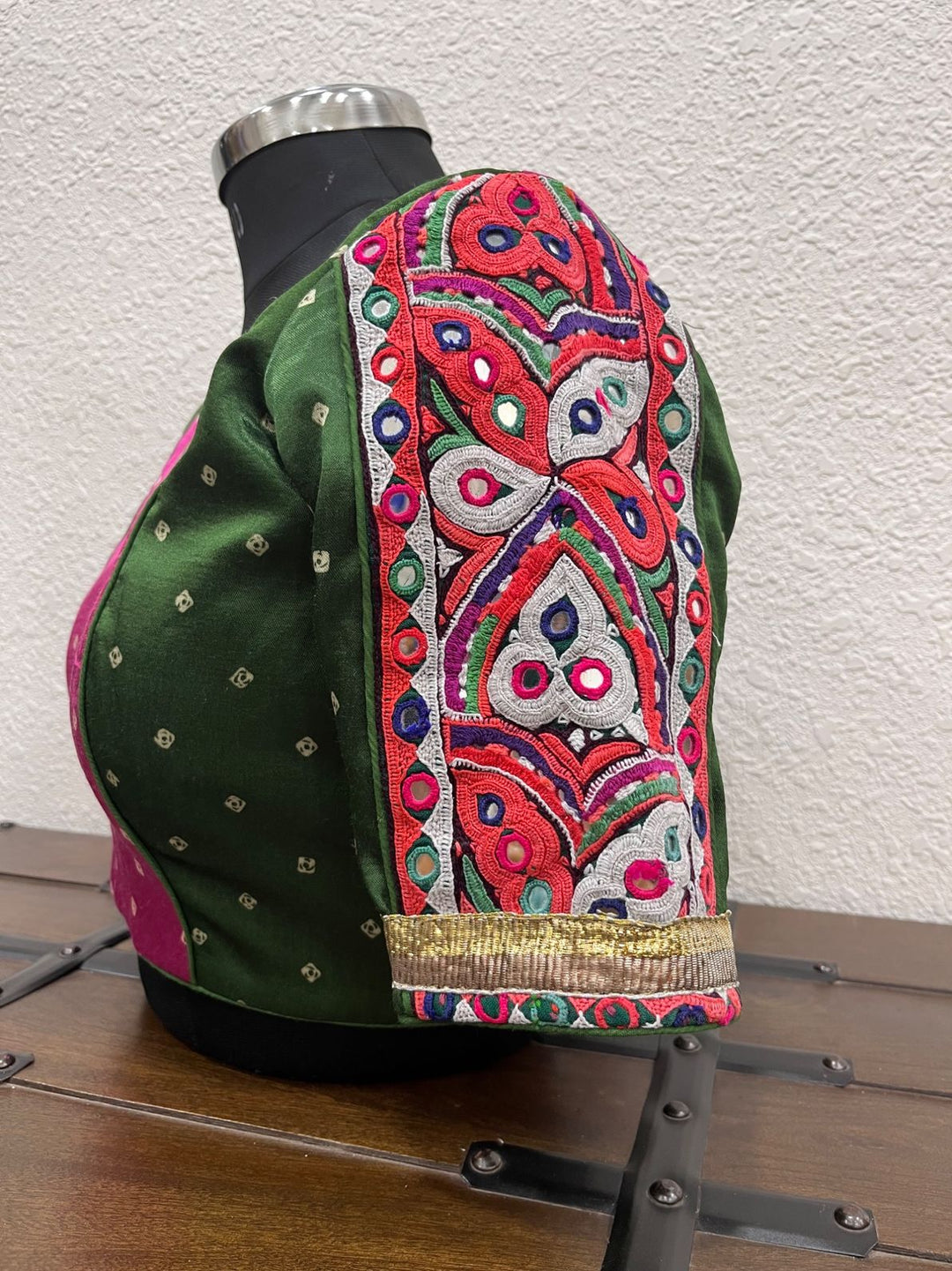 Navratri blouse with bandhej fabric, gamthi work sleeves and V neck design