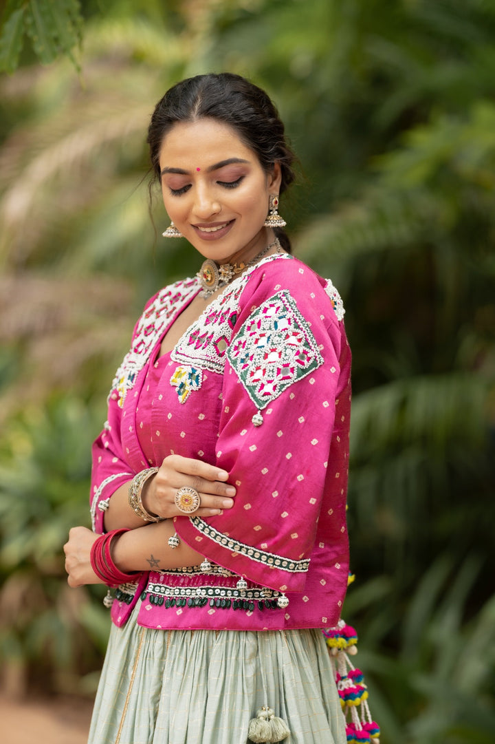 Woman wearing Designer banjara patchwork bandhej jacket for navratri by pohi studio india