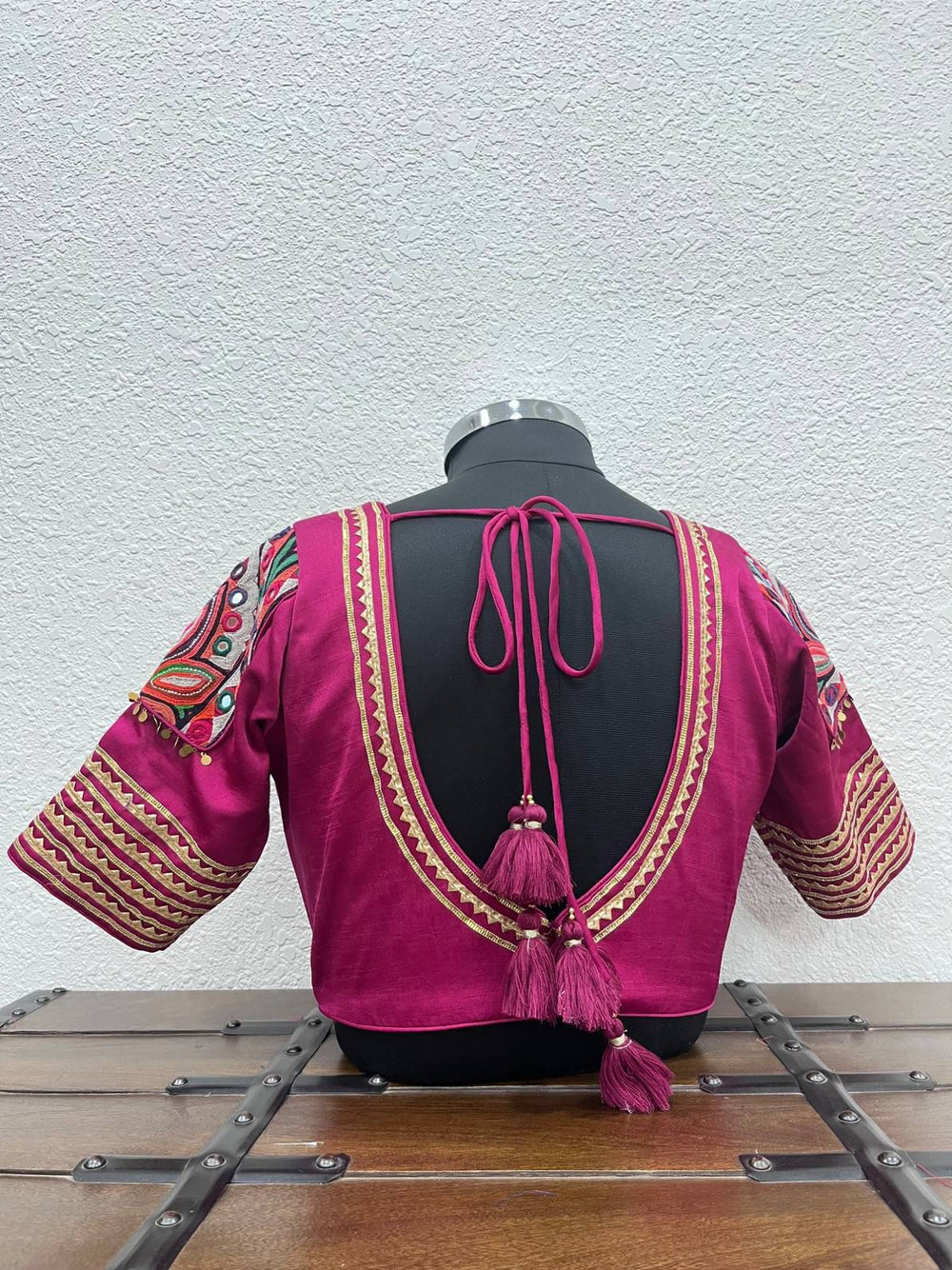 Designer Navratri blouse with raw silk sleeves and triangle gota detailing