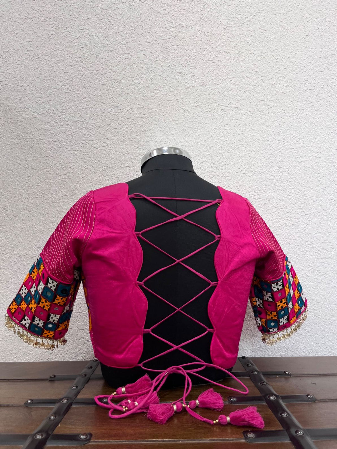 Designer pink Navratri blouse with scallop back and dori detailing