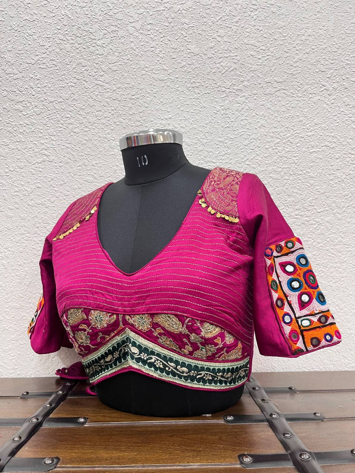 Pink raw silk satin blouse with Kutchi patches and Banarasi border
