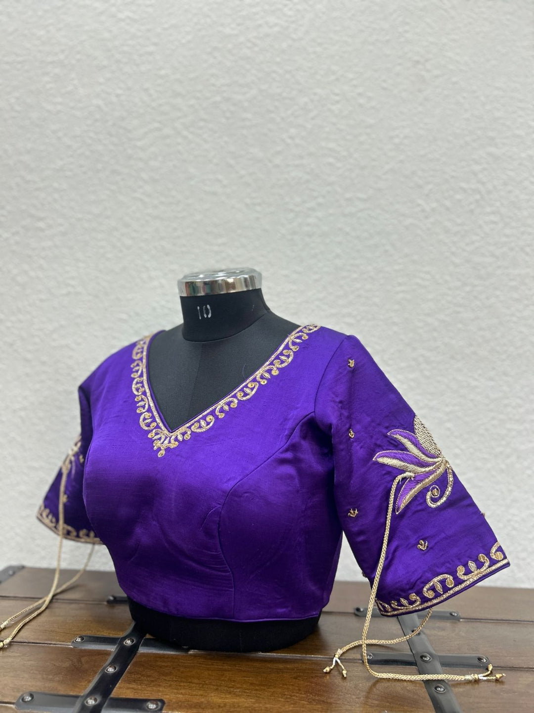 Purple festive raw silk blouse featuring lotus handwork and elegant dori accents
