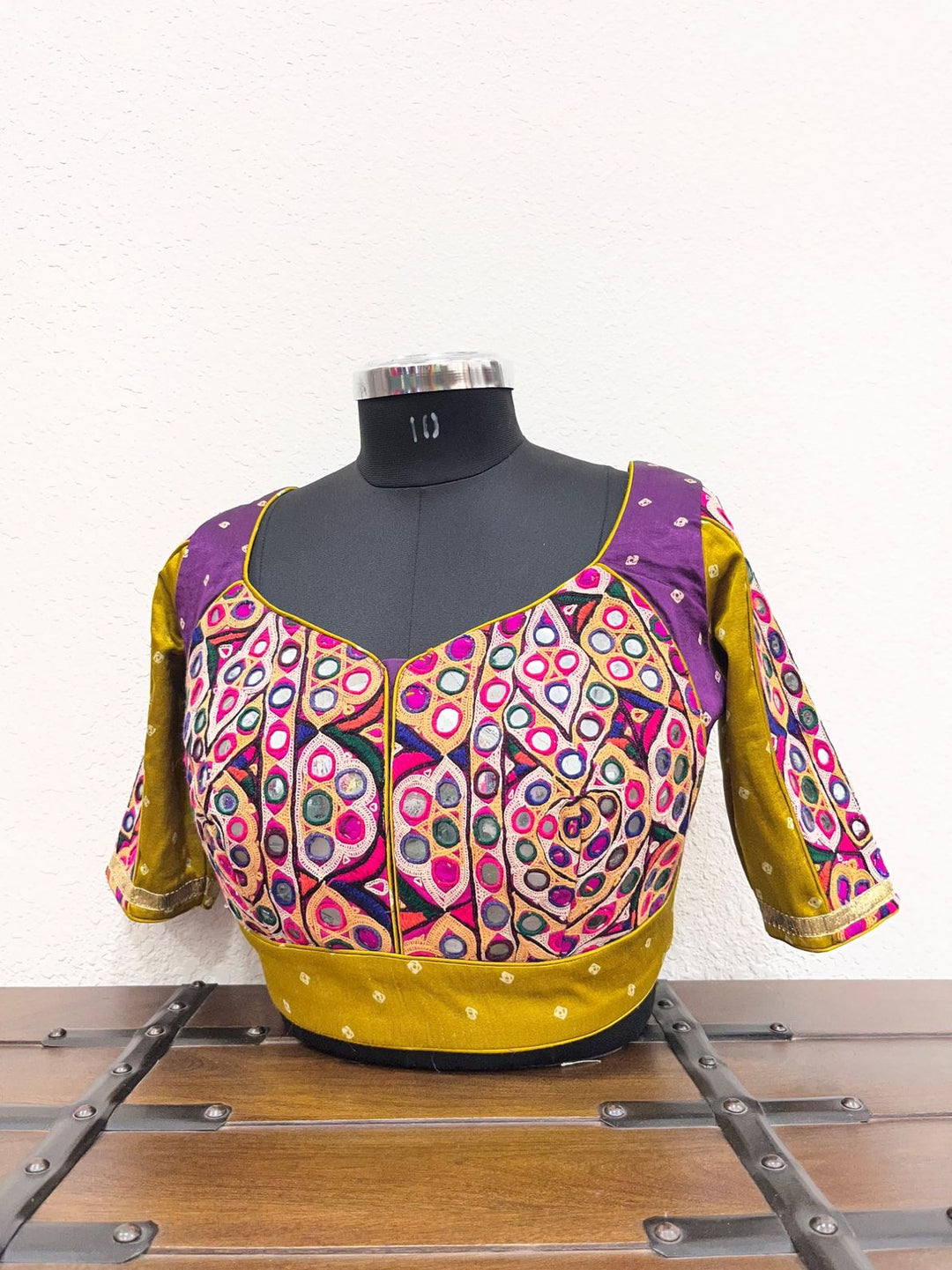 Purple mustard bandhej blouse with mirror gamthi work and golden border