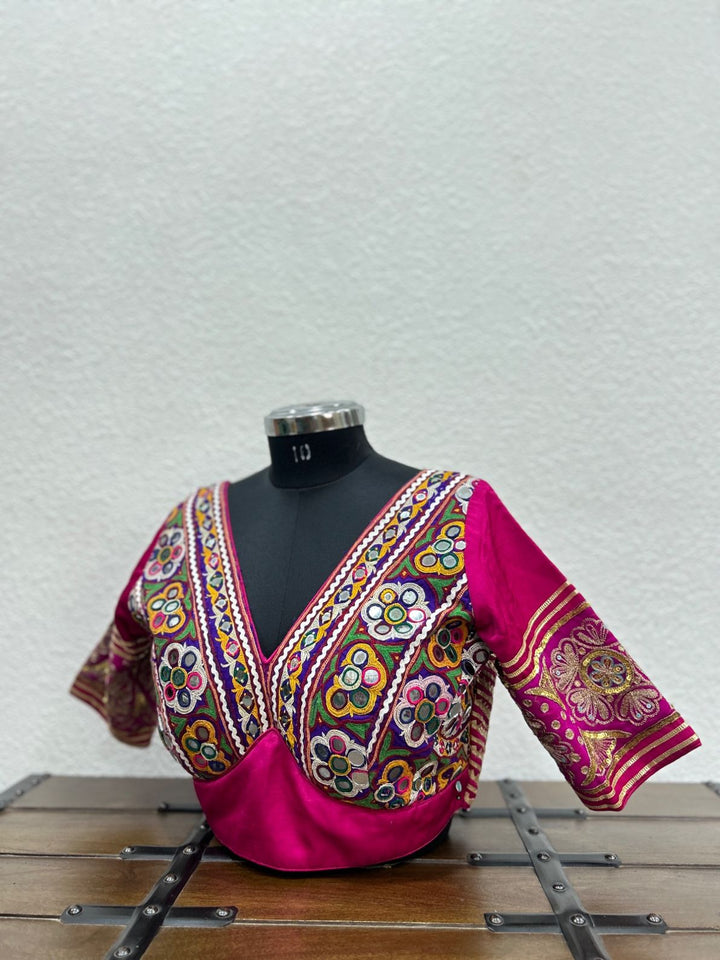 Rani pink raw silk blouse with Kutchi patchwork and vintage detailing