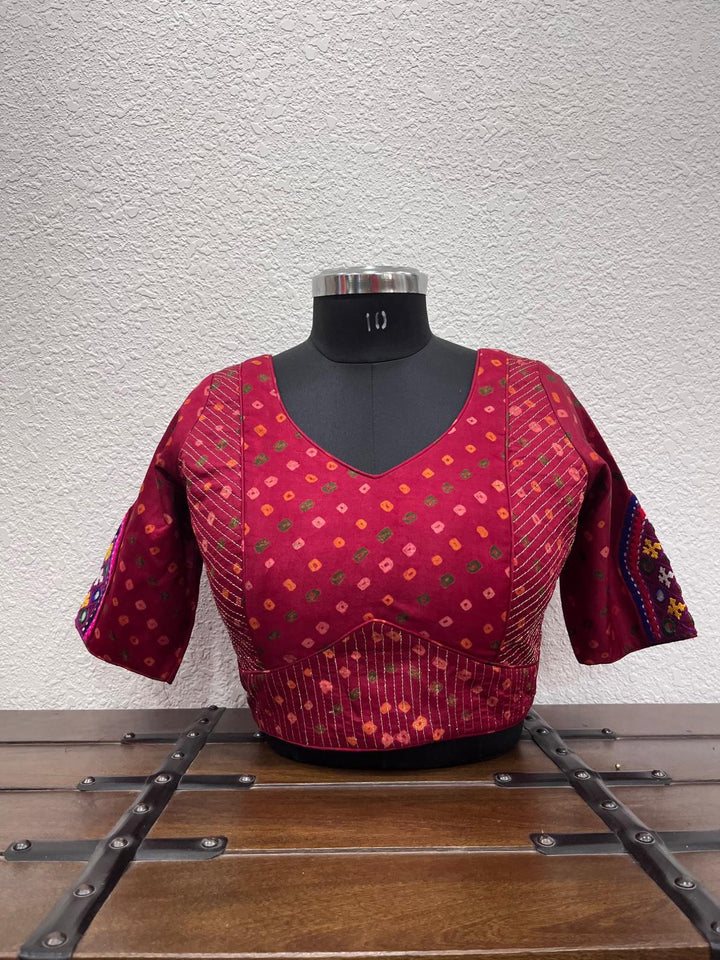Red mashru silk bandhej blouse with mirror patchwork sleeves