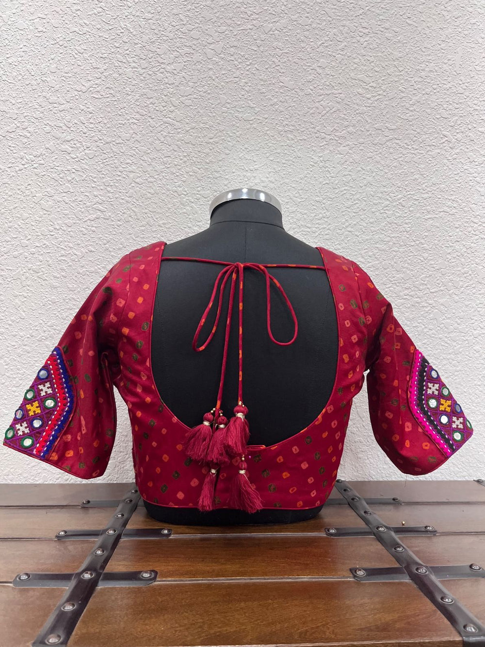 Designer red festive blouse with kasab work and mirror detailing