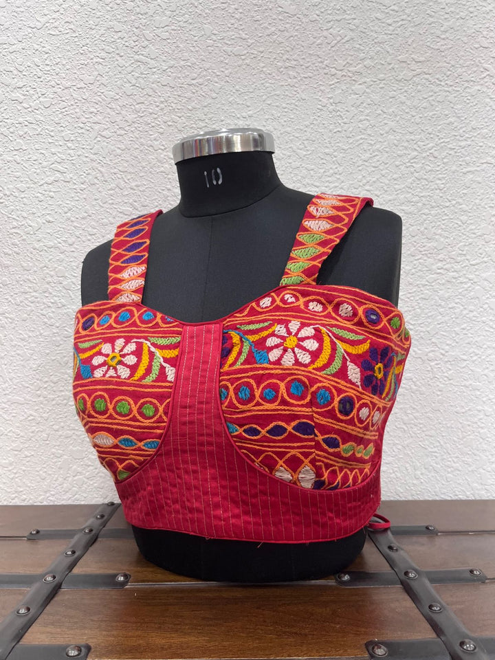 Red raw silk corset blouse with Kutchi embroidery and kasab work