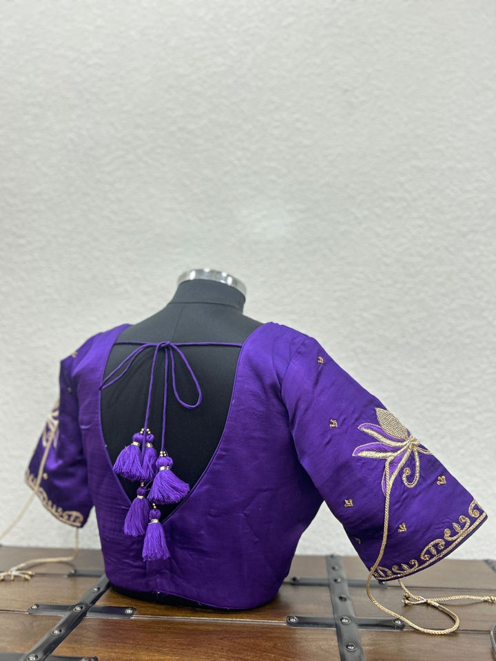 Traditional designer blouse with intricate khat hand embroidery on neckline and sleeves