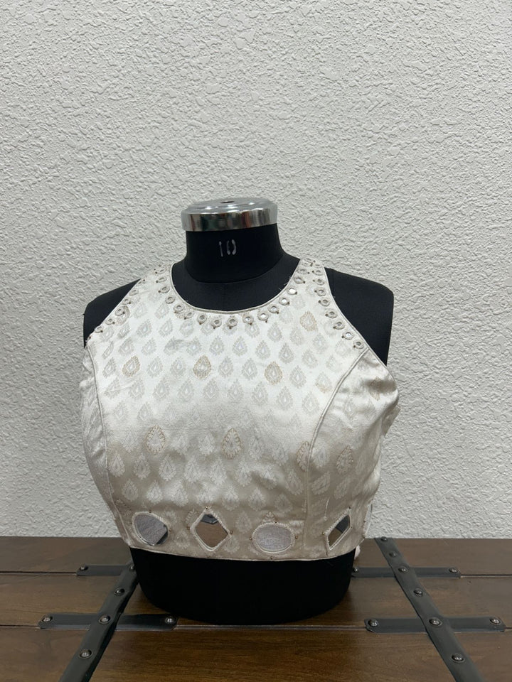 White Gajji silk blouse with intricate mirror work and embroidered detailing