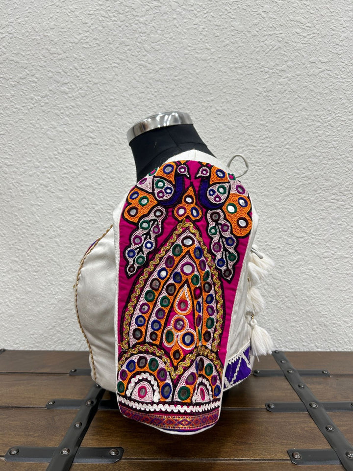 White raw silk satin blouse with vibrant Kutchi patch detailing and lace accents