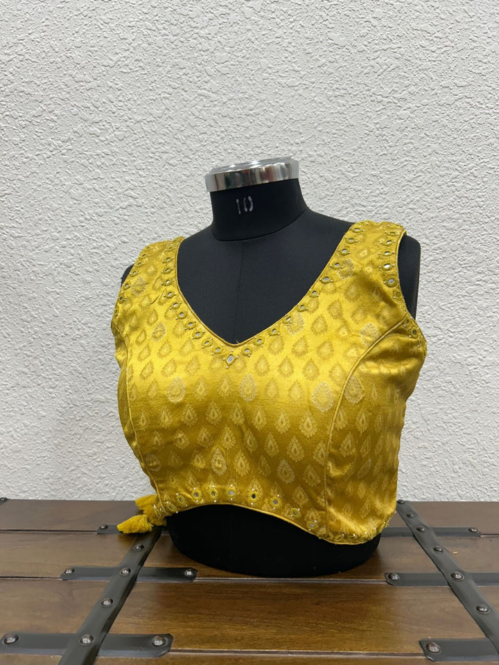 Yellow Gajji silk Navratri blouse with intricate mirror work detailing